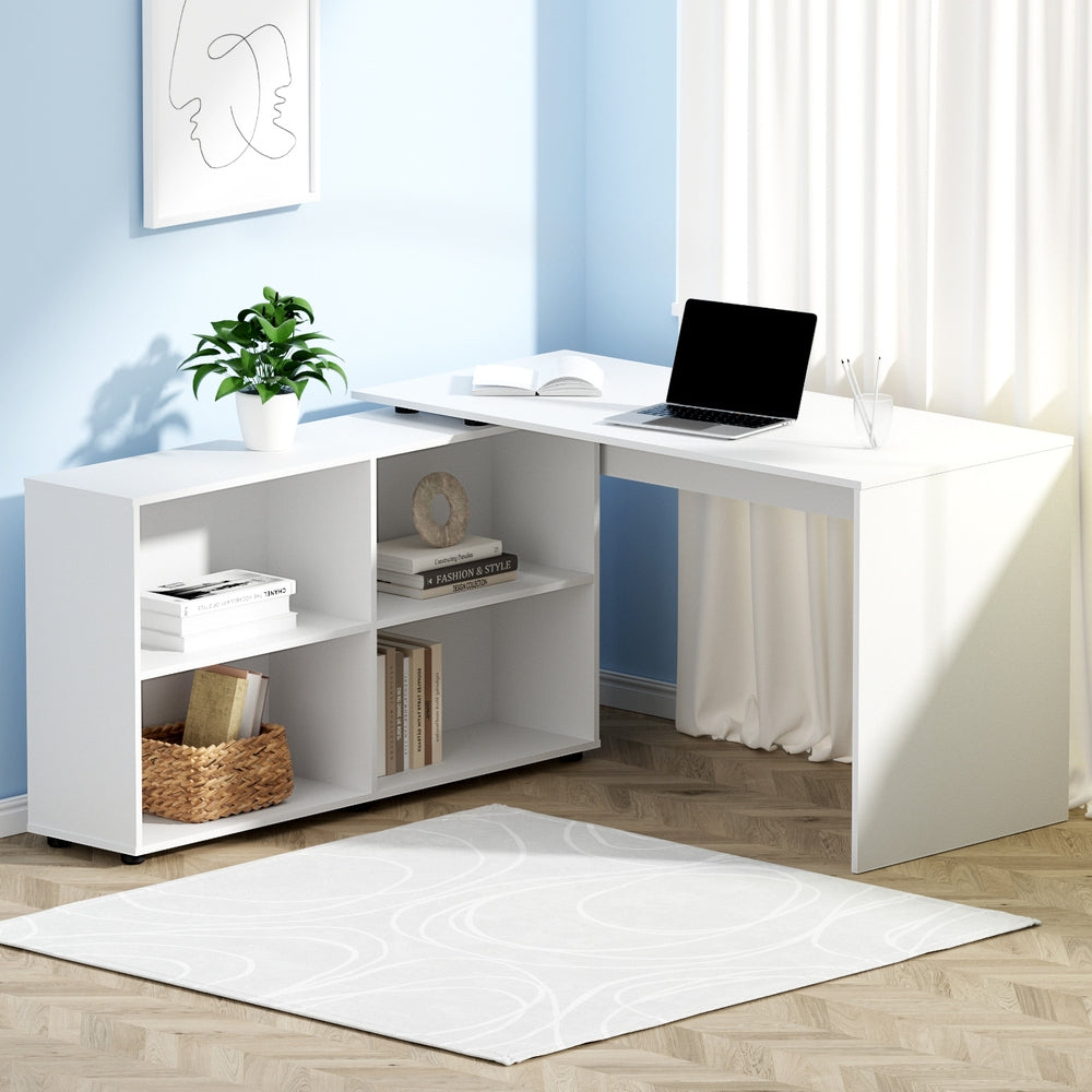 The Apex Adaptive L-shaped corner desk in light oak with white storage drawers, styled in a modern urban home office.